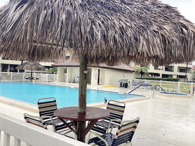 120 1st St E Unit 104, Saint Petersburg, FL 33715 - community pool with a patio area