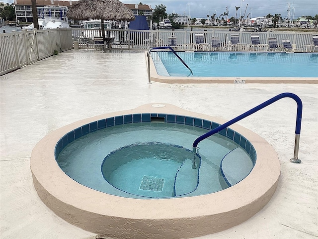 120 1st St E Unit 104, Saint Petersburg, FL 33715 - community pool featuring a gazebo