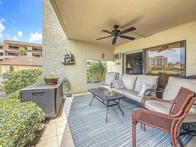 120 1st St E Unit 104, Saint Petersburg, FL 33715 - view of patio featuring ceiling fan and outdoor lounge area