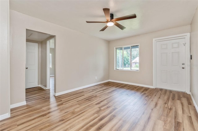 1727 Bonita Ave, Orlando, FL 32805 - empty room featuring a ceiling fan, light wood finished floors, and baseboards