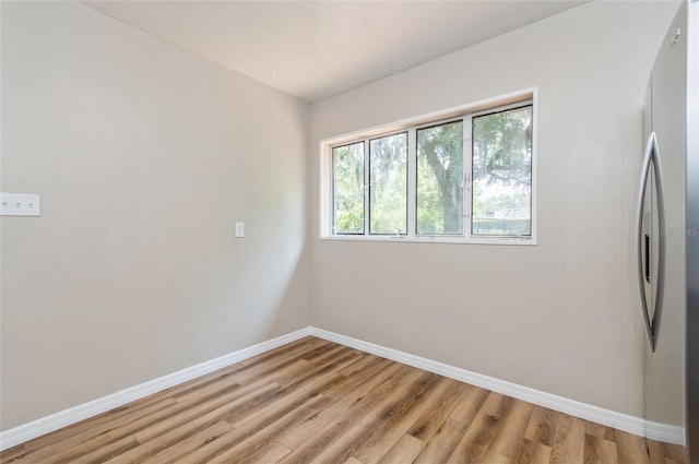 1727 Bonita Ave, Orlando, FL 32805 - unfurnished room featuring light wood-type flooring and baseboards