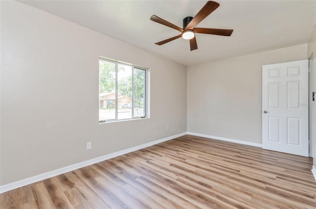 1727 Bonita Ave, Orlando, FL 32805 - unfurnished room featuring a ceiling fan, light wood-style floors, and baseboards
