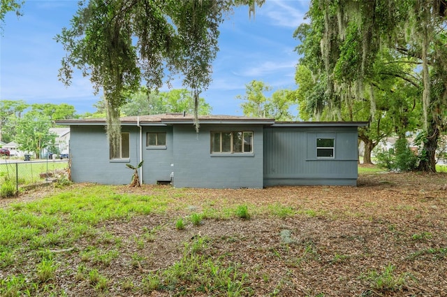 1727 Bonita Ave, Orlando, FL 32805 - back of property with fence and concrete block siding
