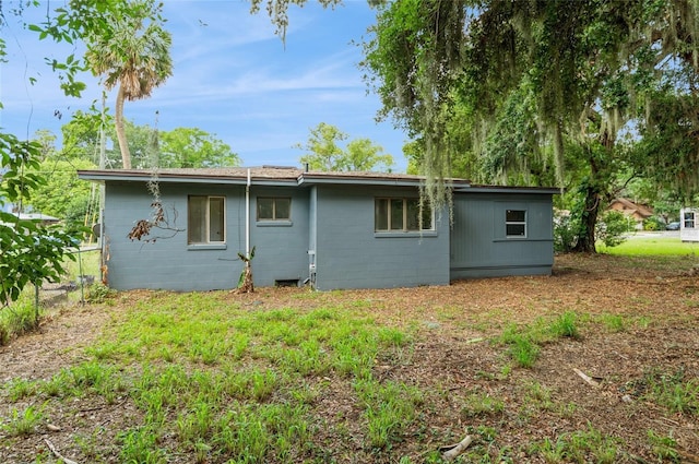 1727 Bonita Ave, Orlando, FL 32805 - rear view of property with concrete block siding