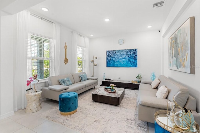 921 Fieldstone Way, Haines City, FL 33844 - living room with tile patterned flooring and recessed lighting