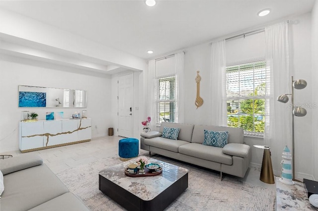 921 Fieldstone Way, Haines City, FL 33844 - living room with plenty of natural light, recessed lighting, baseboards, and marble finish floors