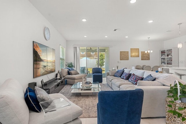 921 Fieldstone Way, Haines City, FL 33844 - living area featuring a chandelier and recessed lighting