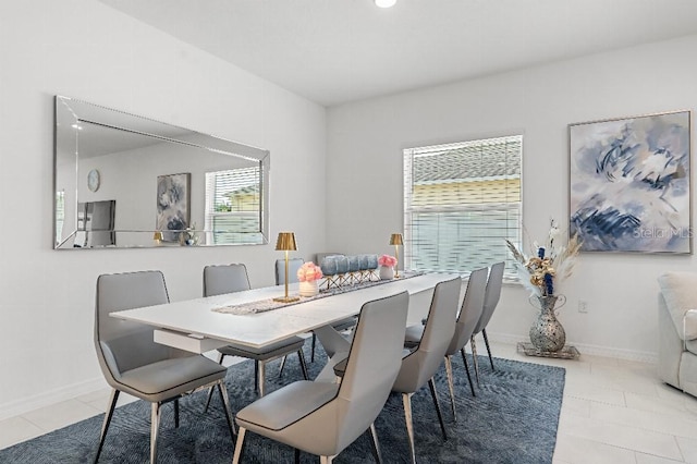 921 Fieldstone Way, Haines City, FL 33844 - tiled dining space with plenty of natural light and baseboards
