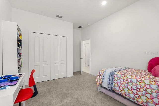 921 Fieldstone Way, Haines City, FL 33844 - bedroom featuring carpet and a closet