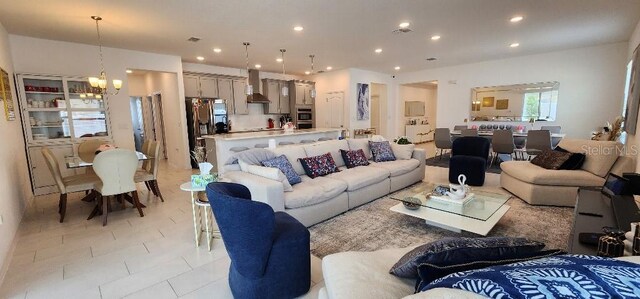921 Fieldstone Way, Haines City, FL 33844 - living area with a chandelier and recessed lighting