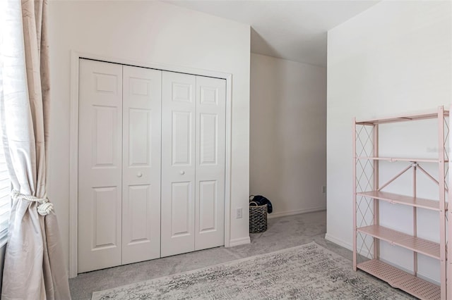 4316 Sailplane Ct, Wesley Chapel, FL 33545 - unfurnished bedroom featuring a closet, baseboards, and carpet floors