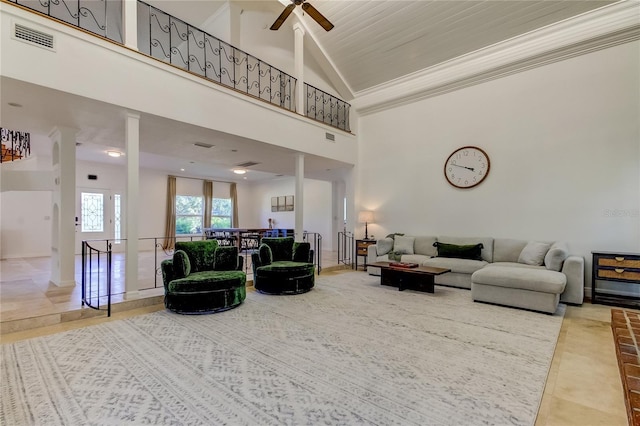1089 Virginia St, Dunedin, FL 34698 - living area with high vaulted ceiling, a ceiling fan, tile patterned floors, and ornamental molding