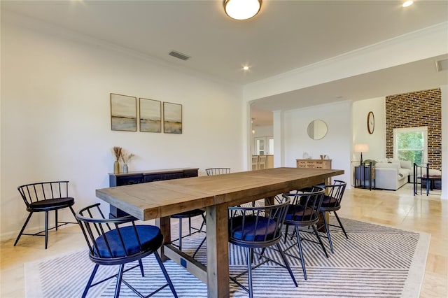 1089 Virginia St, Dunedin, FL 34698 - dining room featuring ornamental molding and baseboards