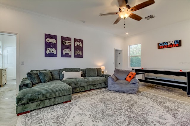 1089 Virginia St, Dunedin, FL 34698 - living area featuring ceiling fan and ornamental molding