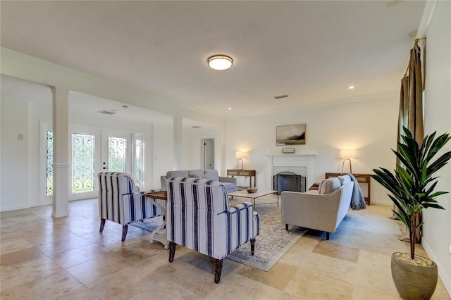 1089 Virginia St, Dunedin, FL 34698 - living room featuring a fireplace, crown molding, baseboards, and light tile patterned floors
