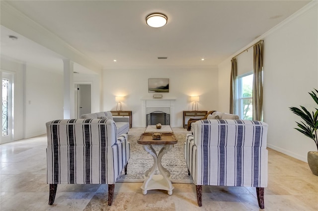 1089 Virginia St, Dunedin, FL 34698 - living room featuring crown molding, a fireplace, and light tile patterned floors