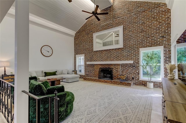 1089 Virginia St, Dunedin, FL 34698 - tiled living room with brick wall, high vaulted ceiling, ceiling fan, a brick fireplace, and ornamental molding