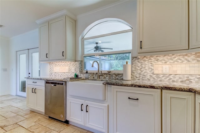1089 Virginia St, Dunedin, FL 34698 - kitchen with dishwasher, a sink, ornamental molding, backsplash, and dark stone countertops