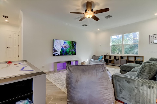 1089 Virginia St, Dunedin, FL 34698 - living room featuring ceiling fan, light wood-style flooring, and recessed lighting