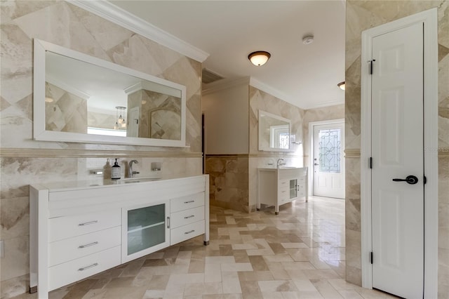 1089 Virginia St, Dunedin, FL 34698 - bathroom featuring tile walls, ornamental molding, and vanity