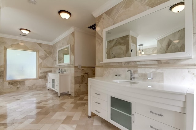 1089 Virginia St, Dunedin, FL 34698 - full bath with tile walls, crown molding, and two vanities
