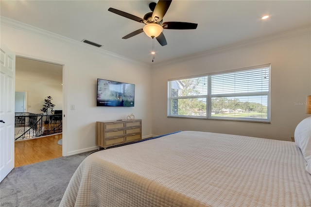 1089 Virginia St, Dunedin, FL 34698 - bedroom with crown molding, carpet floors, ceiling fan, baseboards, and recessed lighting