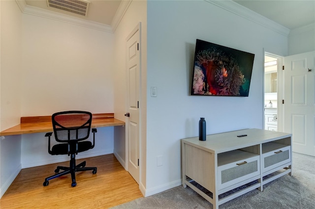 1089 Virginia St, Dunedin, FL 34698 - office area featuring crown molding, baseboards, and wood finished floors