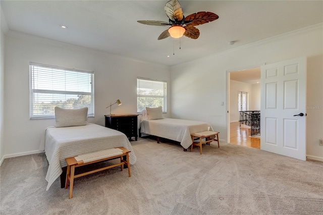 1089 Virginia St, Dunedin, FL 34698 - bedroom with light colored carpet, crown molding, baseboards, and a ceiling fan