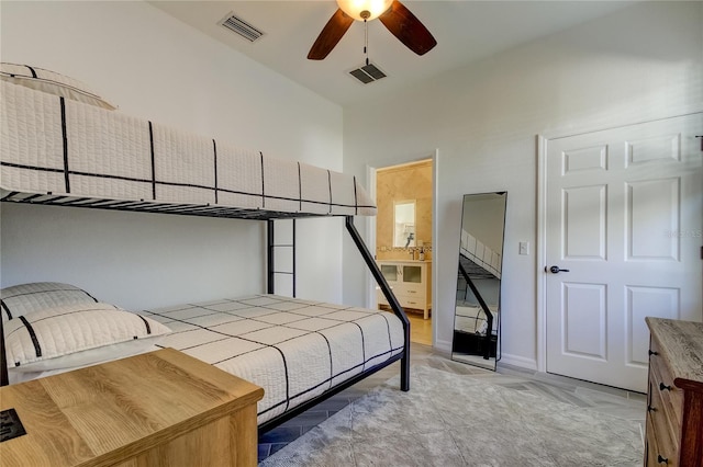 1089 Virginia St, Dunedin, FL 34698 - bedroom with light tile patterned floors and ensuite bath