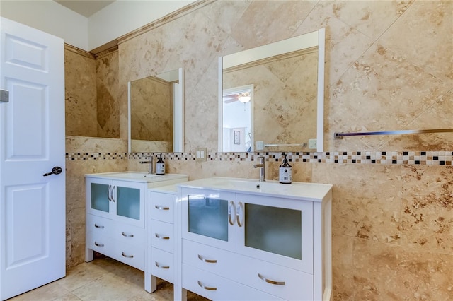 1089 Virginia St, Dunedin, FL 34698 - full bathroom featuring tile walls, vanity, decorative backsplash, and tile patterned flooring