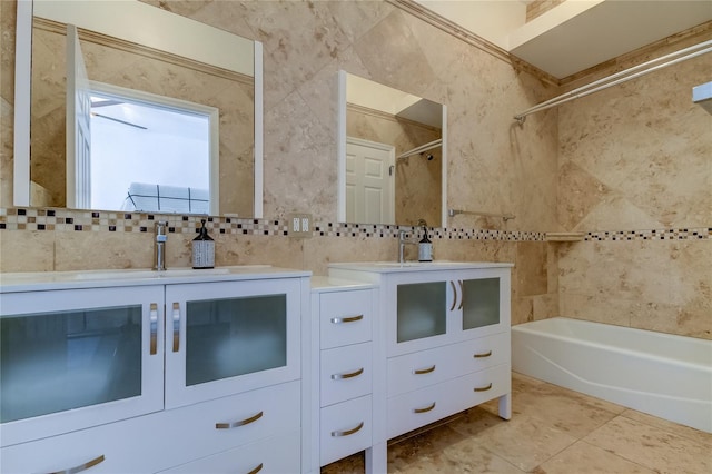 1089 Virginia St, Dunedin, FL 34698 - full bathroom with bathing tub / shower combination, vanity, tasteful backsplash, and tile walls