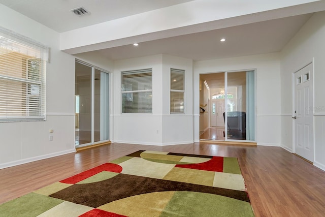2214 Deerbrook Dr, Lakeland, FL 33811 - empty room with wood finished floors, baseboards, and recessed lighting