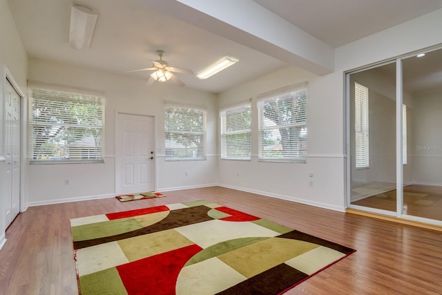 2214 Deerbrook Dr, Lakeland, FL 33811 - interior space with wood finished floors, ceiling fan, and baseboards