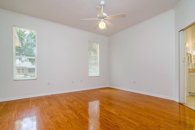 2214 Deerbrook Dr, Lakeland, FL 33811 - unfurnished room featuring light wood finished floors, ornamental molding, a ceiling fan, and baseboards