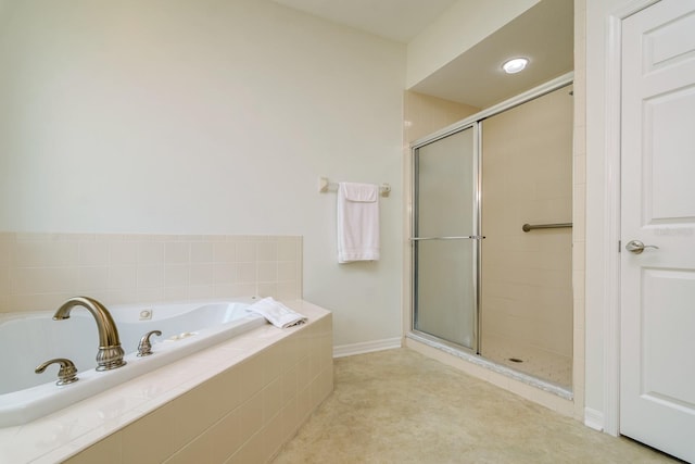 2214 Deerbrook Dr, Lakeland, FL 33811 - full bathroom with a tile shower, a garden tub, and baseboards