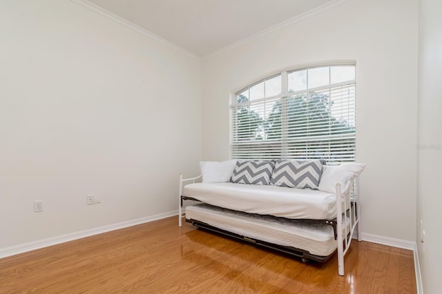 2214 Deerbrook Dr, Lakeland, FL 33811 - living area with light wood-style floors, ornamental molding, and baseboards