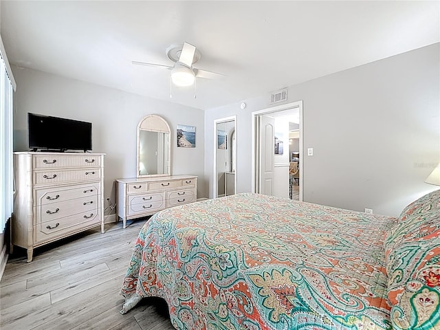bedroom with light wood finished floors and ceiling fan