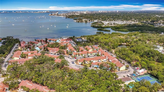 aerial view of property's location with a large body of water