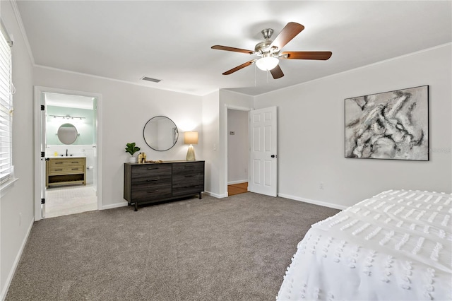 39542 Friends Ave, Zephyrhills, FL 33540 - bedroom with carpet floors, crown molding, connected bathroom, and ceiling fan