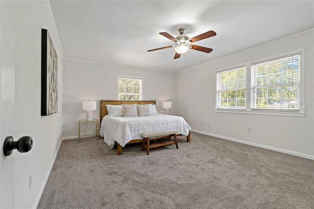 39542 Friends Ave, Zephyrhills, FL 33540 - carpeted bedroom with multiple windows and a ceiling fan