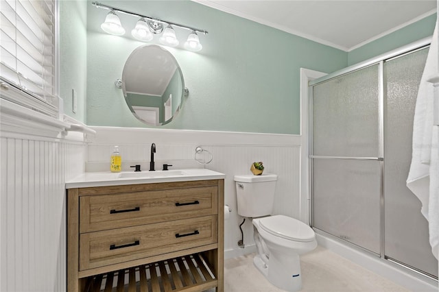 39542 Friends Ave, Zephyrhills, FL 33540 - full bath featuring wainscoting, vanity, a shower stall, and ornamental molding