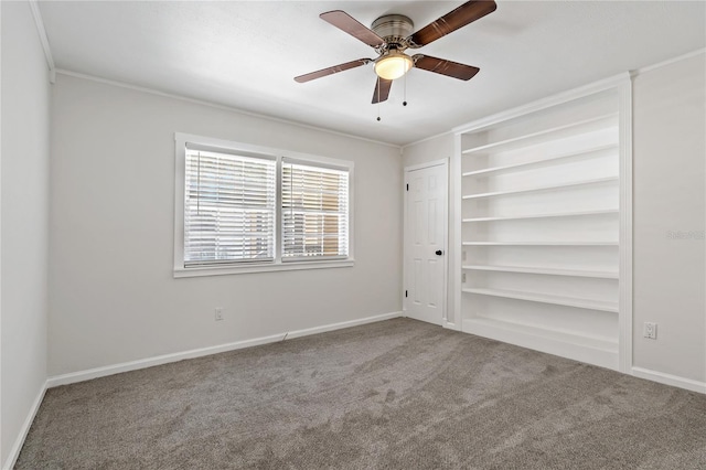 39542 Friends Ave, Zephyrhills, FL 33540 - carpeted spare room featuring ceiling fan and crown molding