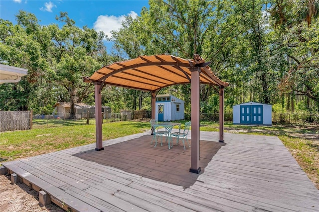 39542 Friends Ave, Zephyrhills, FL 33540 - deck with a storage shed, a fenced backyard, and outdoor dining area