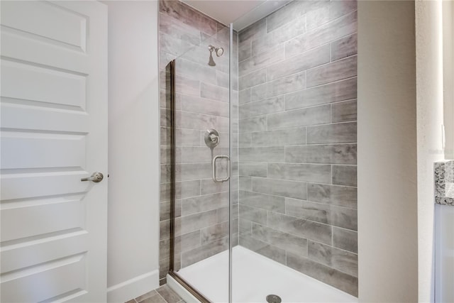 bathroom featuring a stall shower