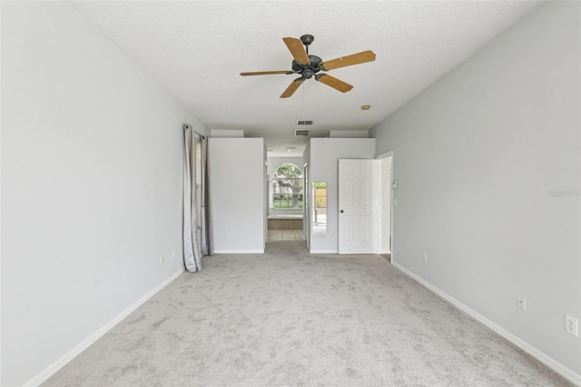 unfurnished bedroom featuring carpet flooring and baseboards