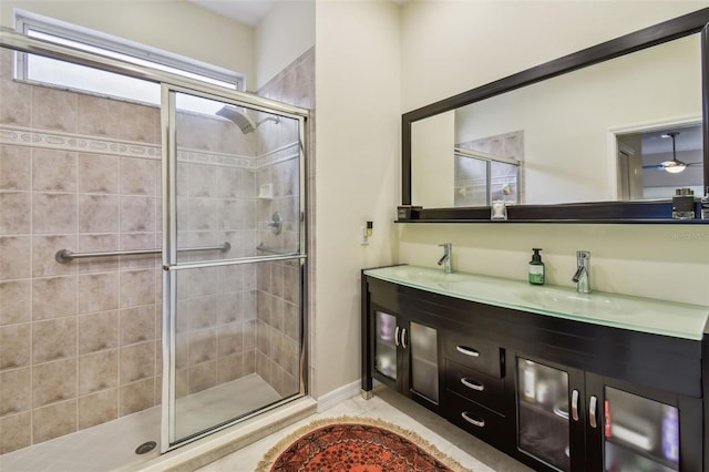 3762 Darston St, Palm Harbor, FL 34685 - full bathroom with a shower stall, tile patterned flooring, and double vanity