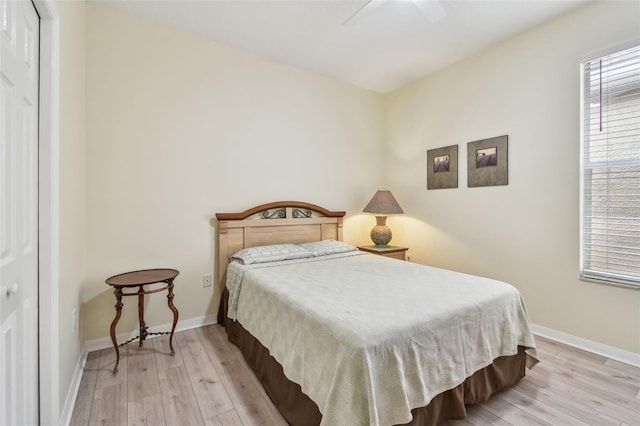3762 Darston St, Palm Harbor, FL 34685 - bedroom featuring light wood-type flooring, baseboards, and a ceiling fan