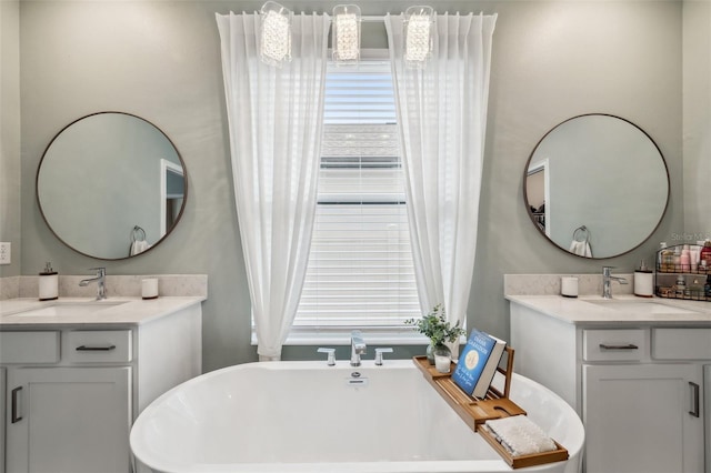 22294 Storybook Cabin Way, Land O Lakes, FL 34637 - full bath featuring two vanities and a soaking tub