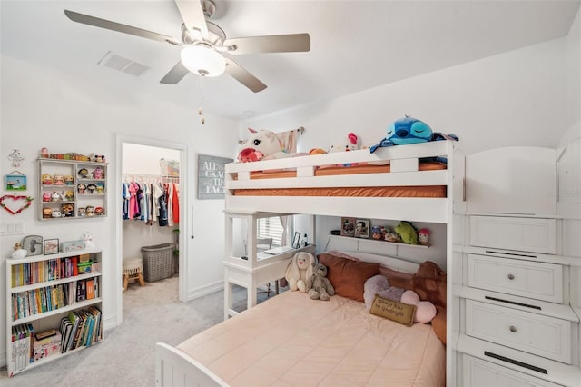 22294 Storybook Cabin Way, Land O Lakes, FL 34637 - bedroom featuring a spacious closet, carpet, a closet, ceiling fan, and baseboards