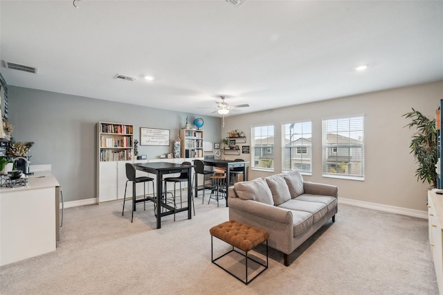 22294 Storybook Cabin Way, Land O Lakes, FL 34637 - living room with light colored carpet, ceiling fan, recessed lighting, and baseboards